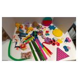 Pop it keychains and wristbands, nerf guns(no bullets) and more