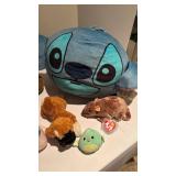 Stitch pillow and stuffed animals