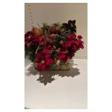 Metal sled with holiday decor