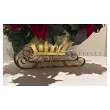 Metal sled with holiday decor
