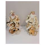 Resin Santas, 10 inches tall.