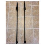 Two metal yard poles with stakes, approx 42 inches.
