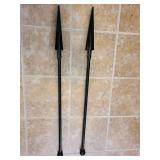 Two metal yard poles with stakes, approx 42 inches.