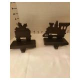 4 cast iron stocking holders and more.