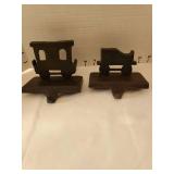 4 cast iron stocking holders and more.