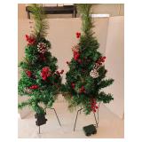 Two light up Christmas trees, 30 inches tall.