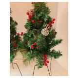 Two light up Christmas trees, 30 inches tall.