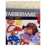 Farberware 100 Piece Cookie Cutter Set, New, Bag inside is Sealed
