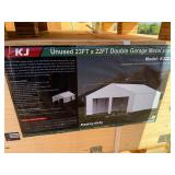 Unused K2223 22 x 23 Double Garage Metal Building:  Cream in color, 26 gauge sheet metal, No Garage Doors, Includes 1 walk through door. 13 ft height