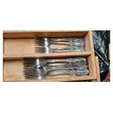 Ornate Silver Flatware Set with Floral Pattern