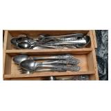 Ornate Silver Flatware Set with Floral Pattern