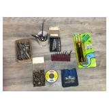 Lots of drill bits, a few nails, and a drain lining