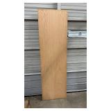 Oak hollow interior door slab - 23 3/4" W x 79 1/8" H x 1 3/4" thick - has very minor damage to the veneer at the bottom on one side