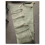 Olive Green Military Grade Canvas Tarp with edge loops for straps - has a few small spots where fabric is worn through, and one corner loop is broken  - approx 106" L x 64" W (musty smell from being i