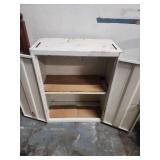 White Metal Storage Cabinet with Adjustable Shelves. 25"W x 12"D x 30"H  wall mountable.  Some patina and finish wear (dirt inside shelves)