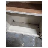 White Metal Storage Cabinet with Adjustable Shelves. 25"W x 12"D x 30"H  wall mountable.  Some patina and finish wear (dirt inside shelves)