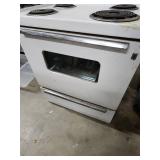 Vintage General Electric White Electric Range - function unknown, no power cord. 30" W x 26" D (including handle) x 44" H