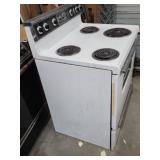 Vintage General Electric White Electric Range - function unknown, no power cord. 30" W x 26" D (including handle) x 44" H