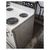 Vintage General Electric White Electric Range - function unknown, no power cord. 30" W x 26" D (including handle) x 44" H