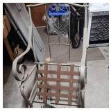 Two decorative metal patio chairs - one partially assembled to show how they go together.  Have all pieces for 2 chairs. One chair needs a strap replaced on the seat.  Minor patina at some of the join