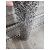 Chain Link Fence Roll - 42" height 9" diameter roll, full length unknown, maybe 6-7 feet) - fencing appears in good condition, no visible rust