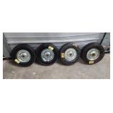 Four 10" Small Equipment Solid Rubber Wheels with Steel Rims (vintage price stickers - you can
