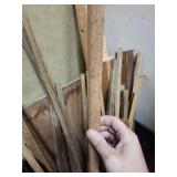 Architectural Wood Salvage Trim Lot - mostly pieces of .5x.5 square trim that are 2 feet long or less.  A couple short 2x4s, and a couple of small 4x4s (black crate not included)