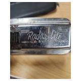 Vintage Radar-Lite Rail Light by Burgess - untested.  Switch on the back red light is stuck and not moving, switch for front light does move. Unsure of battery type