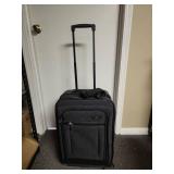Ascot Carry-on Luggage on Wheels with telescoping handle with button activation - 15" W x 10" D x 22" H - Good clean condition.  has 2 gold locks on the zippers but no keys
