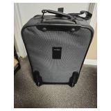 Ascot Carry-on Luggage on Wheels with telescoping handle with button activation - 15" W x 10" D x 22" H - Good clean condition.  has 2 gold locks on the zippers but no keys