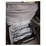 Ascot Carry-on Luggage on Wheels with telescoping handle with button activation - 15" W x 10" D x 22" H - Good clean condition.  has 2 gold locks on the zippers but no keys