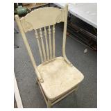 Vintage Decorative Spindle Back Wooden Chair with Carved Scroll Details- Chair is wobbly and loose and needs refinished. Cream color - needs repainted