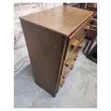 Vintage 4 drawer wood dresser - has integrity issues and has a very slight wobble, would need significant repair. Drawers all function well. 24 W x 14 D x 36.5 H. Has some spots on finish on front (mi