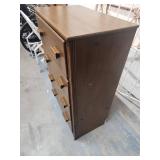 Vintage 4 drawer wood dresser - has integrity issues and has a very slight wobble, would need significant repair. Drawers all function well. 24 W x 14 D x 36.5 H. Has some spots on finish on front (mi