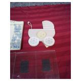 Grandmother themed and Baby Carriage themed picture frames, small wicker basket, like new pink burp rag, and 4 small magnetic photo frames for your fridge!