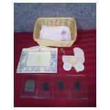 Grandmother themed and Baby Carriage themed picture frames, small wicker basket, like new pink burp rag, and 4 small magnetic photo frames for your fridge!