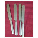 Vintage Alaska Warranted butter knives - set of 4.