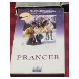 11 VHS Family and Kids Movies - including several Christmas Classics - Frosty the Snowman, Rudolph, the Santa Clause, Prancer and more