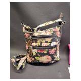 FLORAL SHOULDER STRAP BAG WITH MAKE UP SAMPLES AND EYE MASKS WITH PINK LEATHER MAKE UP BAG WITH MANICURE SET