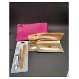 FLORAL SHOULDER STRAP BAG WITH MAKE UP SAMPLES AND EYE MASKS WITH PINK LEATHER MAKE UP BAG WITH MANICURE SET