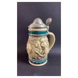Avon 1990 Decorative Elephant Scene Beer Stein with Lid. Approximately 5.5 inches tall