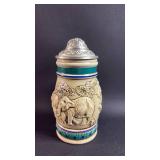 Avon 1990 Decorative Elephant Scene Beer Stein with Lid. Approximately 5.5 inches tall