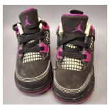 Air Jordan 4 Retro infant/toddler shoes in a black, fuchsia flash, and liquid lime color scheme. Size 5c