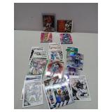 12 Piece Football Trading Cards, Set Includes  Metallic Patrick Mahomes, Holographic Joe Montanna, Holographic Quenton Nelson, 2005 MVP  Predictor Deuce McAllister and Many Others-UNAUTHENTICATED