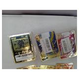 APPEARS NEW - 7 Piece Gold Metal Pokemon Cards-Ancient Mewtwo, Arceus VMAX (Blue), Arceus VMAX (Red), Charizard V, VMAX Venusaur, Charizard & Blastoise Tagteam, Charizard VMAX, and Charizard DX- UNAUT