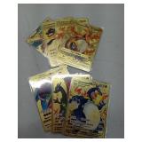 APPEARS NEW - 7 Piece Velaco Gold Metal Pokemon Cards- UNAUTHENTICATED