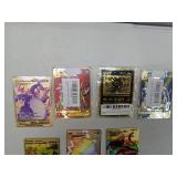 7 Piece Gold Metal Pokemon Cards-Ancient Mewtwo, Arceus VMAX (Blue), Arceus VMAX (Red), Charizard VMAX, VMAX Venusaur, Charizard & Blastoise Tagteam, Charizard VMAX, Pikachu VMAX, and Charmander, Char