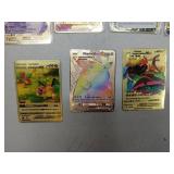 7 Piece Gold Metal Pokemon Cards-Ancient Mewtwo, Arceus VMAX (Blue), Arceus VMAX (Red), Charizard VMAX, VMAX Venusaur, Charizard & Blastoise Tagteam, Charizard VMAX, Pikachu VMAX, and Charmander, Char