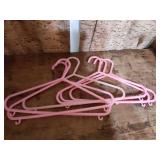 Pink Plastic Clothes Hangers Set