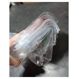 Henoyso 24 Pcs Red and Green Christmas Clear Gift Bags Plastic Goodie Candy Treat Bag with Handles PVC Gift Wrap Totes with Ribbon for Xmas Party Favors (7.8 x 7.8 x 3.1)